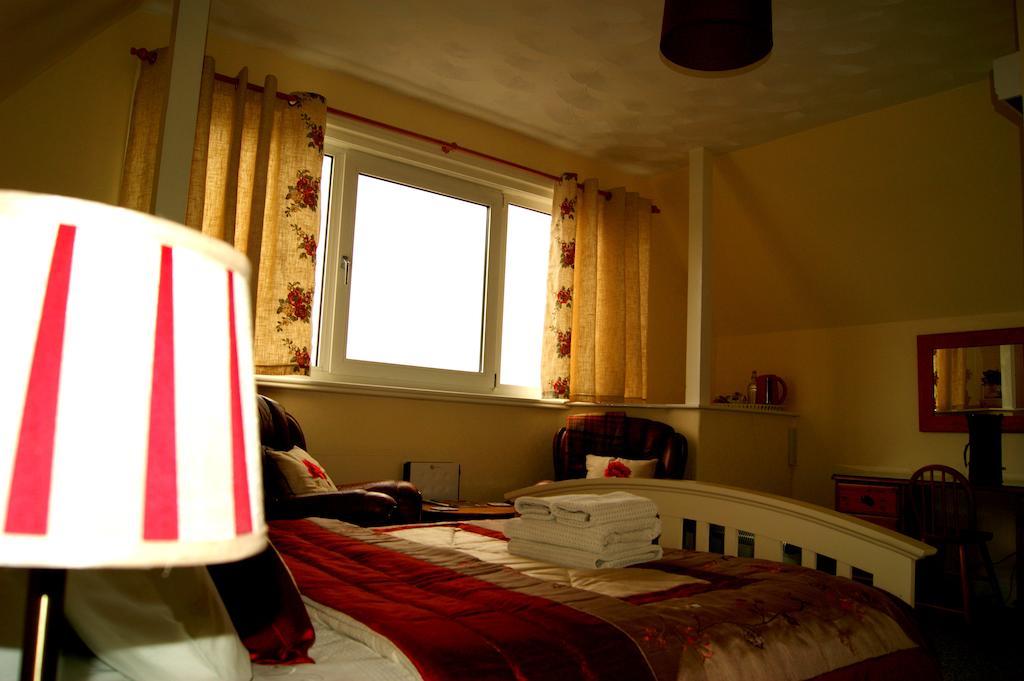 Sunset Guest House 헌스탠턴 외부 사진 A bedroom