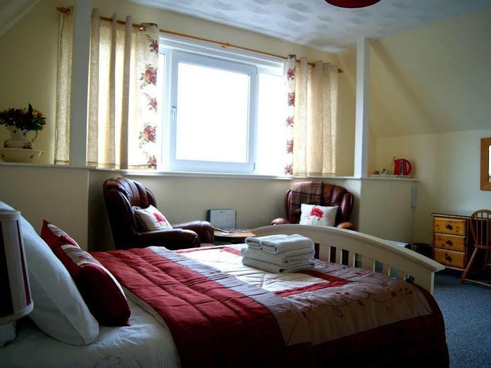 Sunset Guest House 헌스탠턴 외부 사진 A typical bedroom